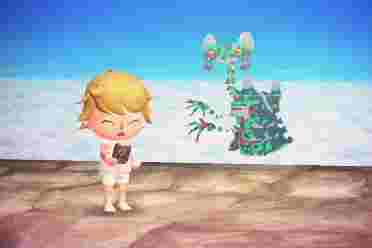 玩家在《动森》中重现《王国之泪》的初始空岛场景